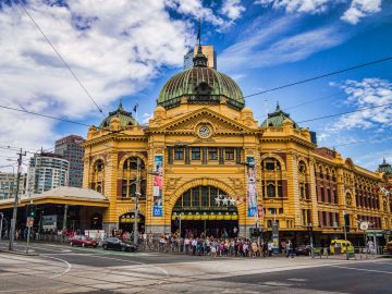 Flinders Street Station in Melbourne. Designed by James Fawcett and H. P. C. Ashworth in 1899, over 110,000 commuters and 1,500 trains pass through the station every weekday.
